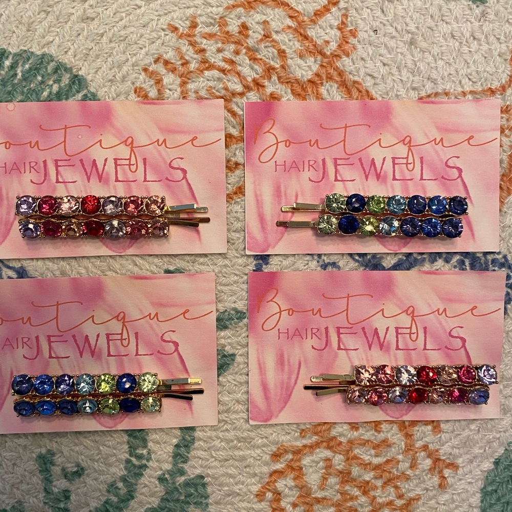 Beautiful jeweled hair clip.  2 in each pack.  Take all for 16!
